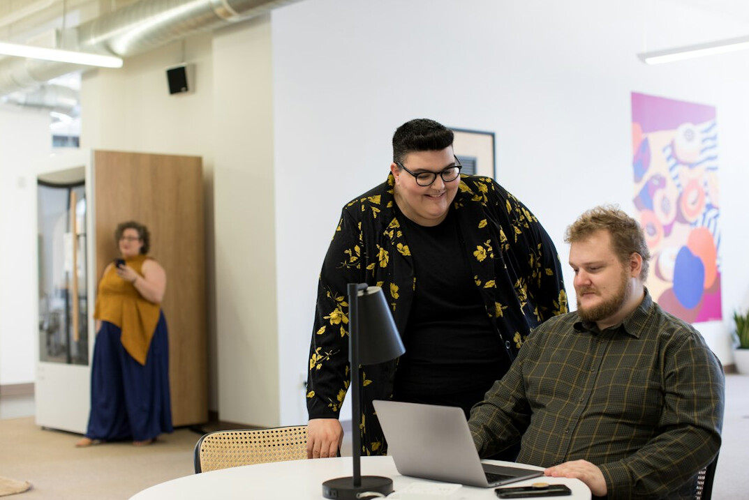 programmers coding in modern office